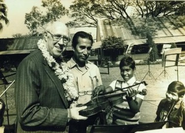 Maestro Mstislav Rostropovich with Ananta Makhal and the Students of Oxford Mission Orphanage. Maestro was so surprised to know about the amazing symphony orchestra of OM Orphanage that he couldn't help but dropped in to the mission to meet the children during his visit to Calcutta - India (few decades ago)
